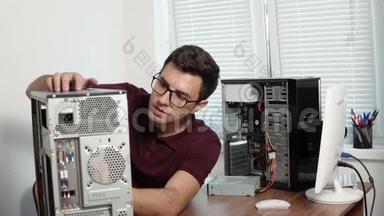 集中计算机服务人员在眼镜中修理办公室的坏电脑，并升级计算机硬件
